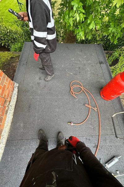 Flat roof being repaired in Allen